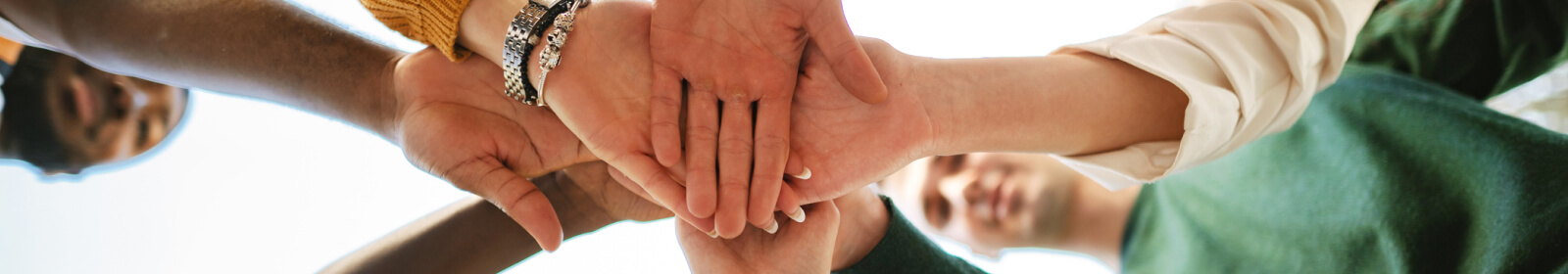 hands stacked in teamwork